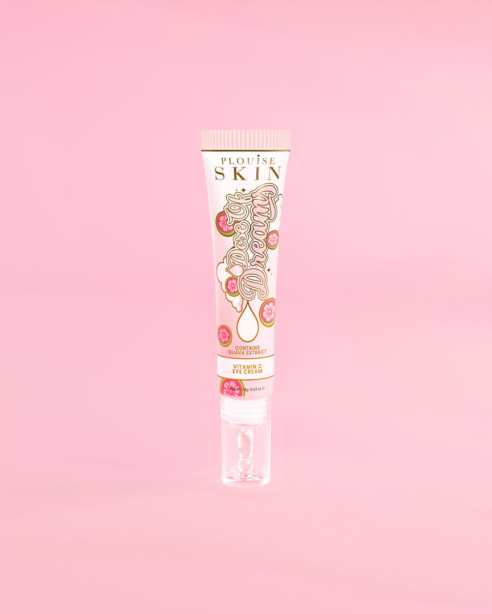 Tube of P. Louise Dose Of Dreams C-vitamiini Brightening Eye Cream vaaleanpunaisella taustalla