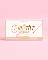 Suljetun P.Louise Creative Comeback XXXL Rainbow Eyeshadow Paletin etupuoli kultaisella typografialla vaaleanpunaisessa kotelossa vaaleanpunaista taustaa vasten