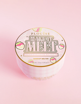 A container of P.Louise Make It Melt Makeup Cleansing Balmr with a pink label and gold accents on a pink background