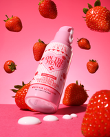 Vaaleanpunainen pullo mansikkaa P.Louise On The Mend Barrier Repair Lotion -voidetta