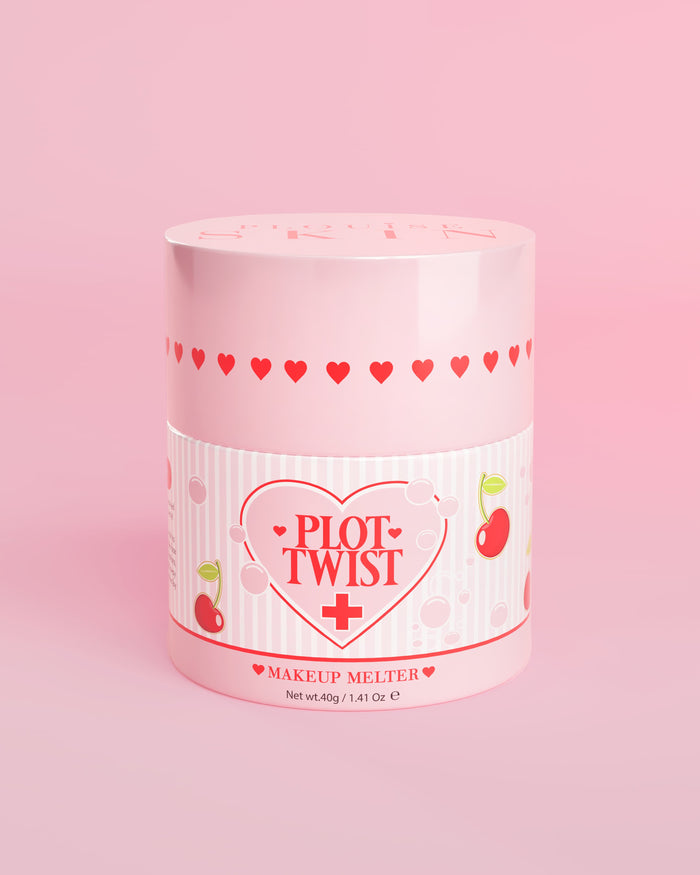 Vaaleanpunainen säiliö P.Louise Plot Twist Makeup Melting Cleansing Balm -puhdistusvoidetta, jonka etiketissä on sydän- ja kirsikkakuvioita vaaleanpunaista taustaa vasten