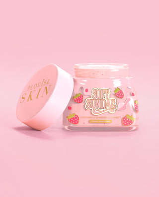 Pink jar of P. Louise soft sundae ice cream whipped moisturiser with the lid off on a pink background